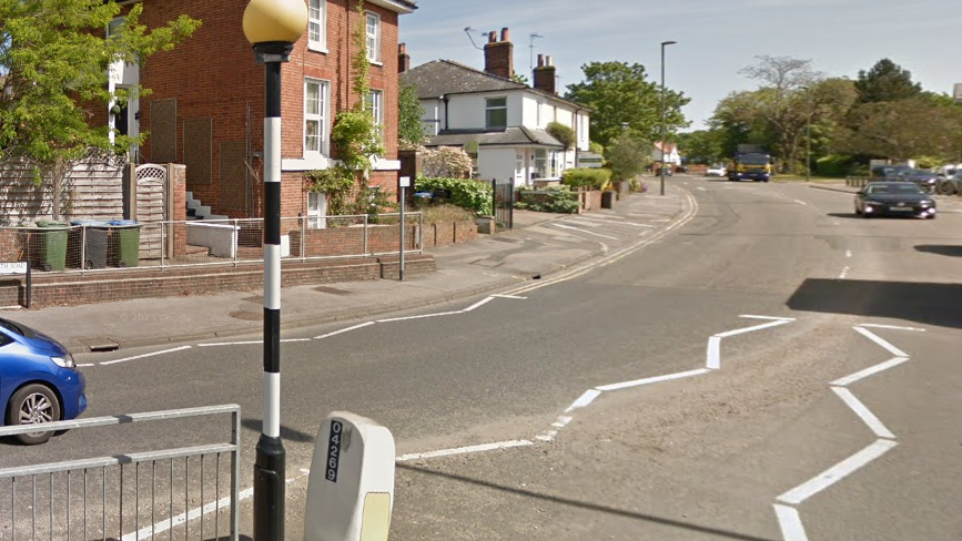 A street sign in Portsmouth Road, Esher.