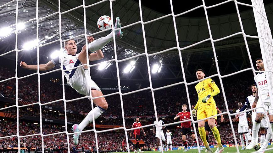 Micky van der Ven clears the ball off the line