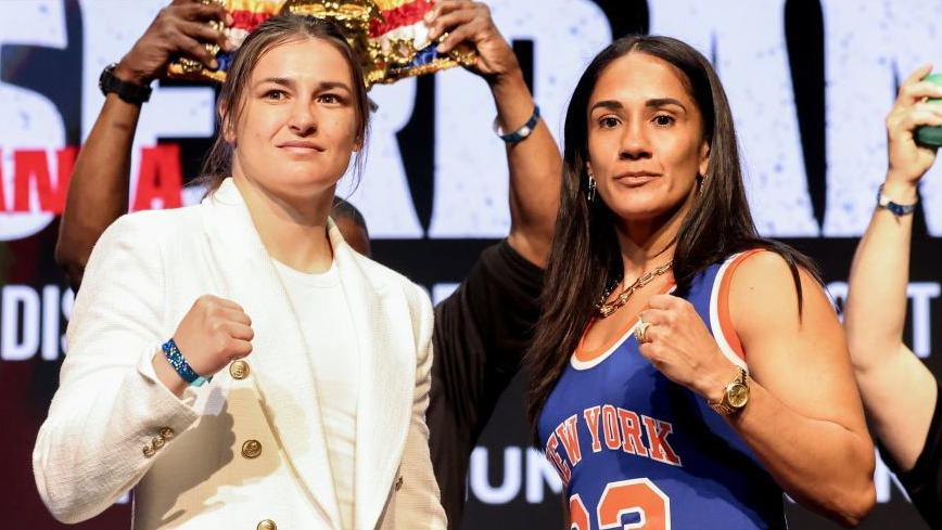 Katie Taylor and Amanda Serrano pose for photos at a news conference