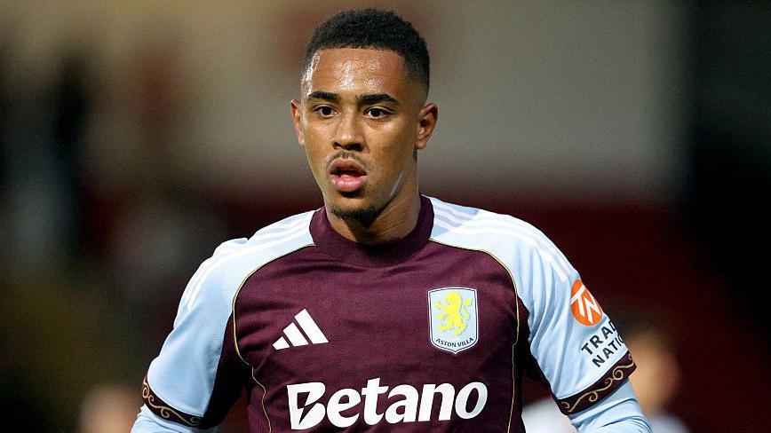 Jacob Ramsey wearing an Aston Villa shirt