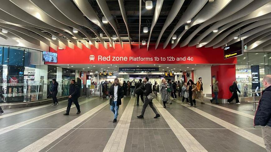 People on the concourse at New Street Station