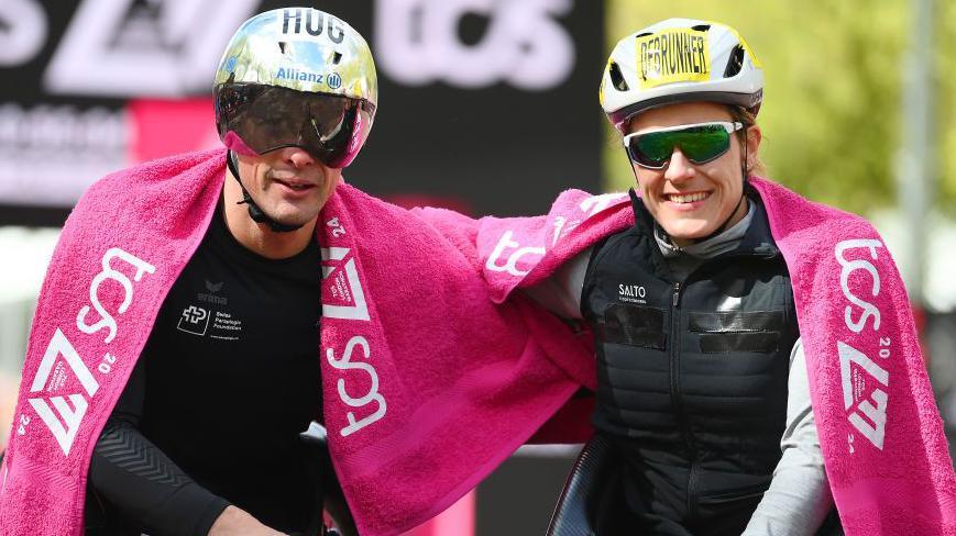 Marcel Hug and Catherine Debrunner celebrate winning their 2025 London Marathon titles
