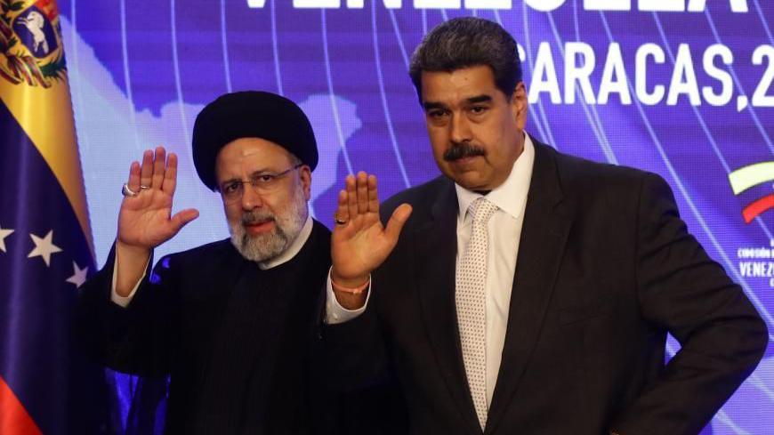 President of Venezuela, Nicolas Maduro (R) and the President of Iran, Ebrahim Raisi, wave prior to a joint declaration in Caracas, Venezuela, 12 June 2023. 