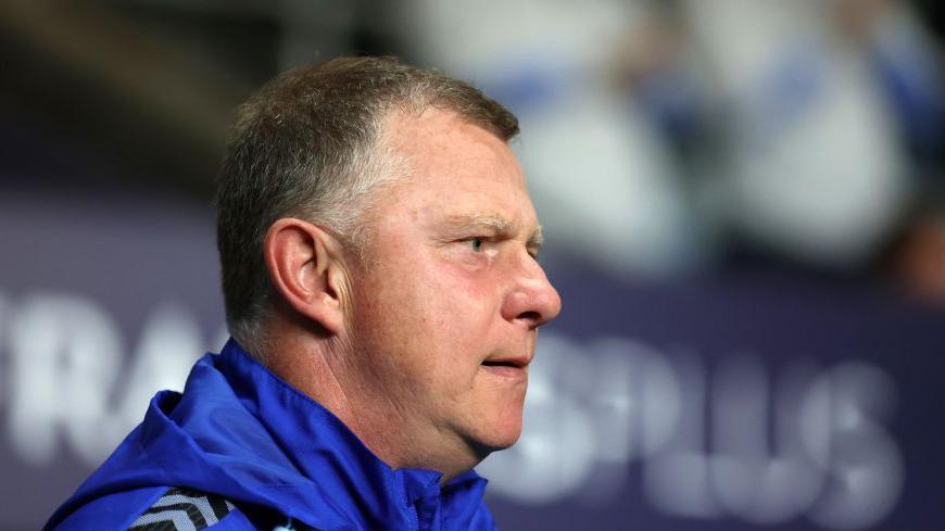 Mark Robins looks on from the sidelines as Coventry City boss