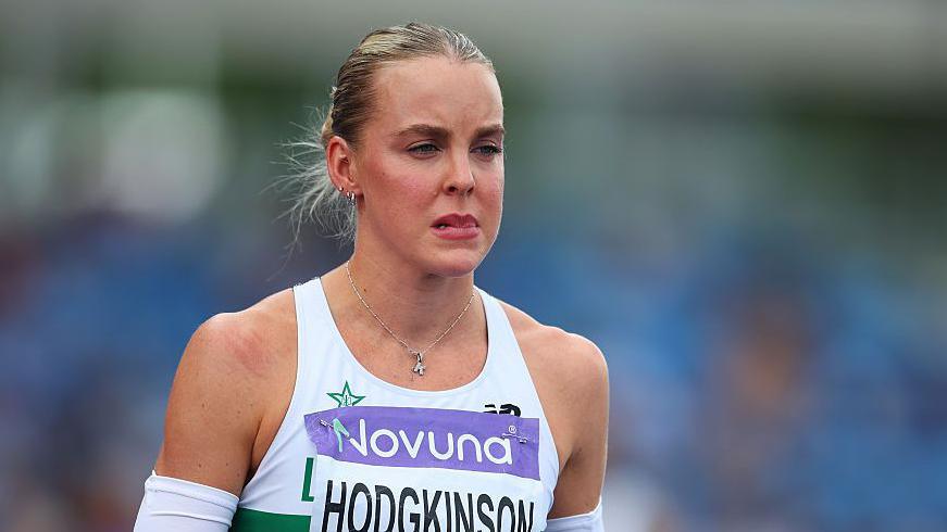 Keely Hodgkinson looks on and bites her lip before withdrawing from the women's 400m final at the UK Athletics Championships 