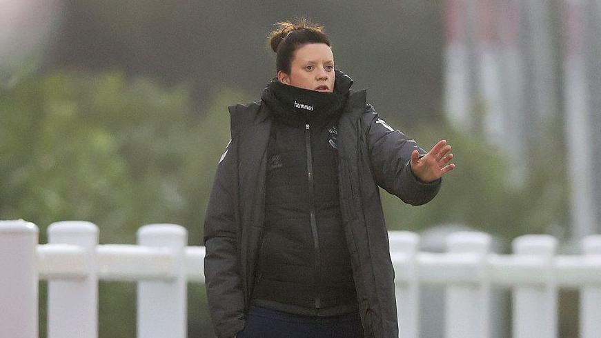 Lauren Phillips pictured on the touchline at a match