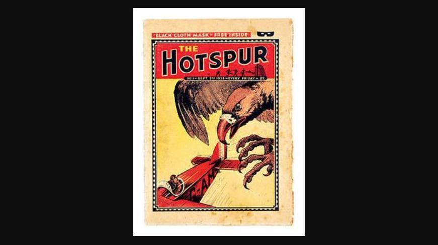 Photograph of The Hotspur comic which was published by DC Thomson. The image is of a first edition. The cover shows a huge bird of prey bearing down on a bi-plane with a pilot looking over his shoulder at the bird's talons.