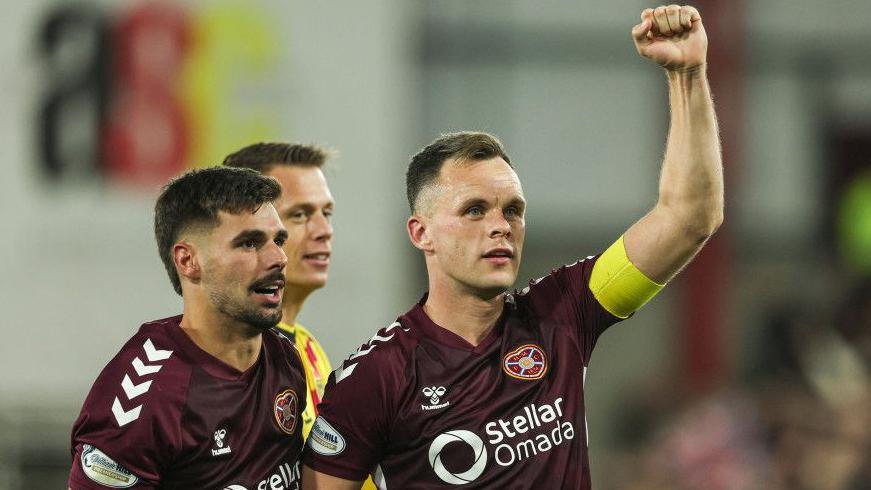Hearts' Claudio Braga and Lawrence Shankland