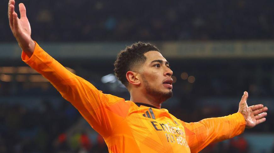 Jude Bellingham celebrates scoring Real Madrid's winner against Manchester City at Etihad Stadium