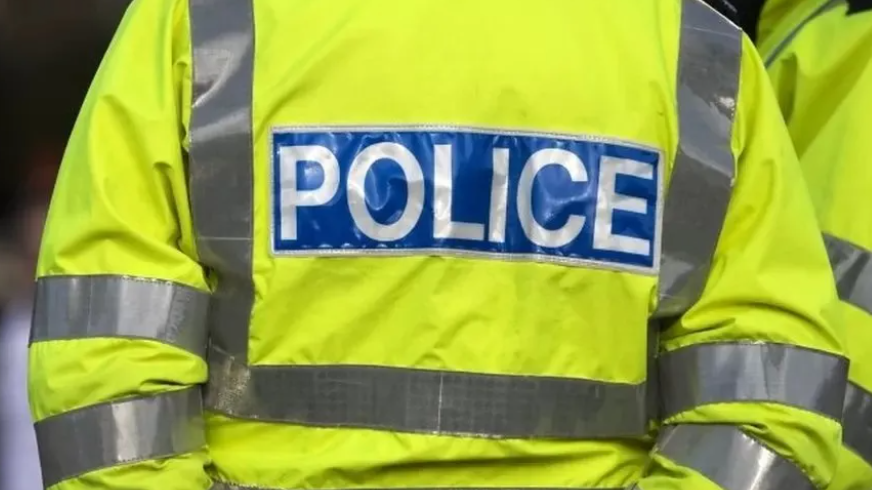 Police officer hi-vis jacket which reads 'Police'