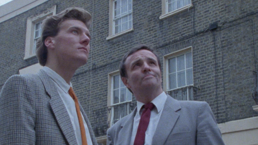 screenshot of Two men assess real estate for the best way to earn as much as they can