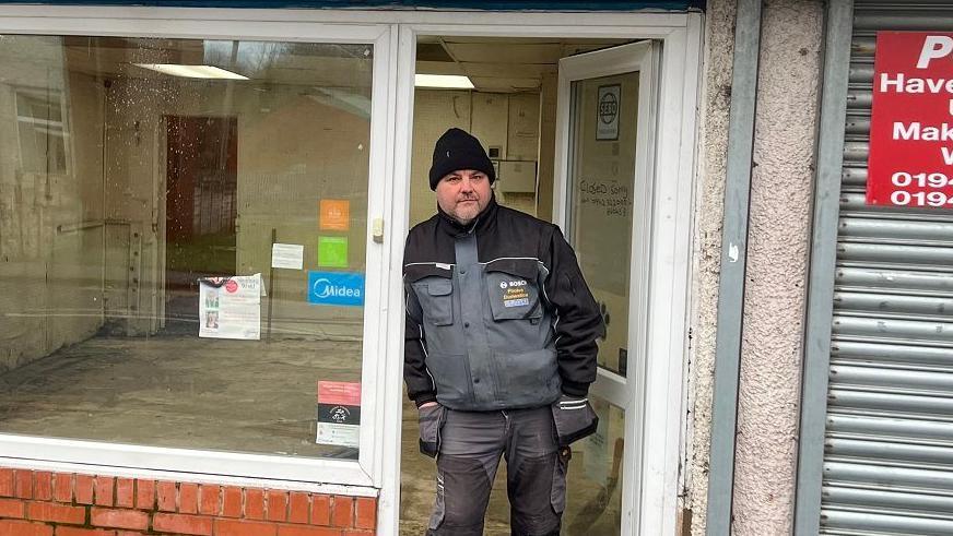 Domestics co-owner Mike Horton outside the shop on Walthew Lane which will not be reopening