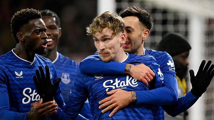 James Garner celebrates