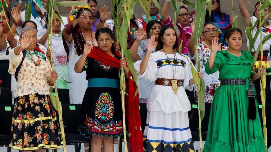 People attend a ceremony where Mexico's new President Claudia Sheinbaum receives the "baton of command", at Zocalo Square in Mexico City, Mexico October 1, 2024.