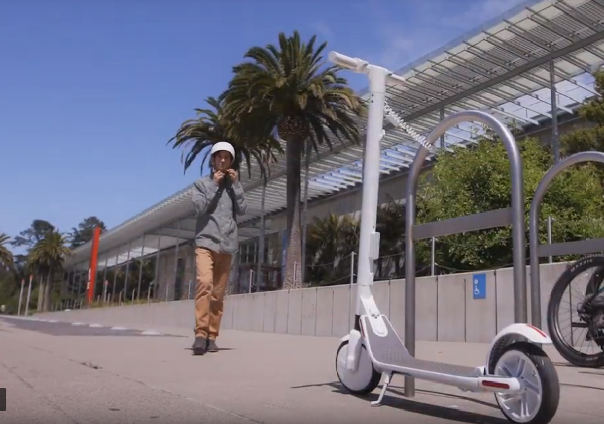 A white Unicorn scooter.