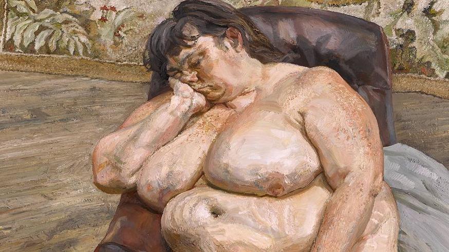 A close-up of part of a large painting shows a seated, nude figure resting heavily in a dark armchair, positioned slightly off-centre. The figure has one arm supporting the head, while the other arm rests across the lap. The edge of the lion carpet is behind her.