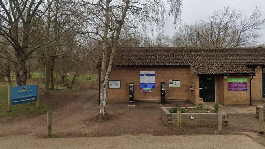 Car park at country park showing parking machines