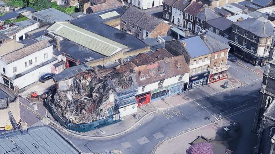 The former New Inn pub. It lies in ruins following a blaze in 2022