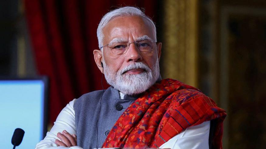 Indian Prime Minister Narendra Modi listens to French President's speech during the closing session of the Franco-Indian Economic Forum at the Quai d'Orsay following the Artificial Intelligence (AI) Action Summit in Paris, on February 11, 2025. 