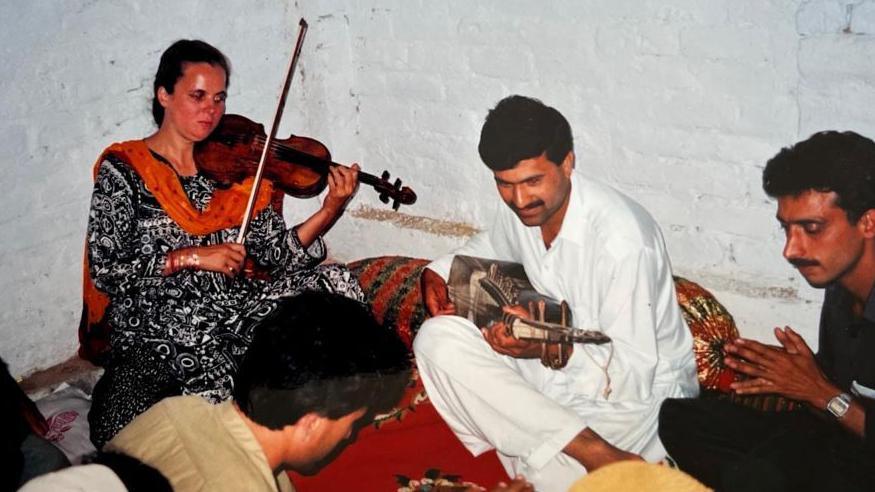 Anne Wood and musicians in Pakistan