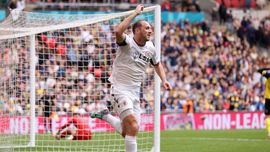 Michael Cheek celebrates scoring for Bromley at Wembley