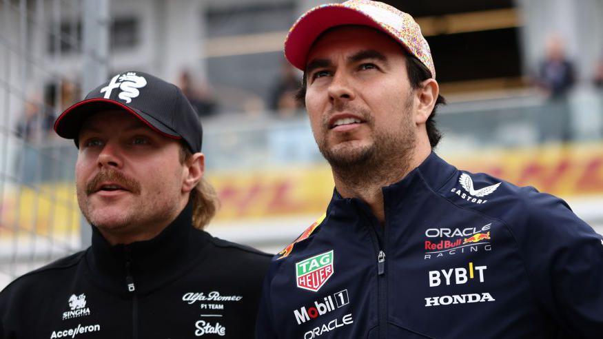 Valtteri Bottas and Sergio Perez stood next to each other at the 2023 Canadian Grand Prix