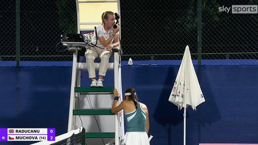 Emma Raducanu speaks to chair umpire Miriam Bley during her match at the Dubai Tennis Championships