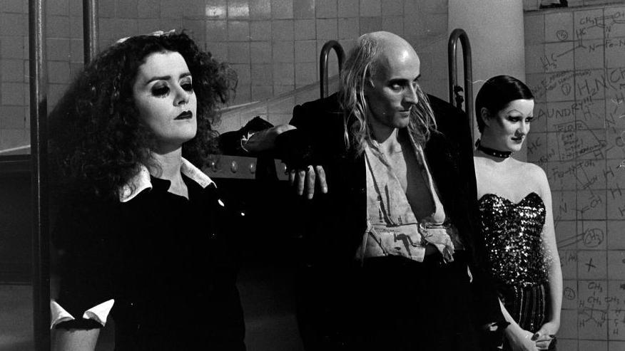 Patricia Quinn, Richard O'Brien, and Nell Campbell prepare for filming during production of The Rocky Horror Picture Show at Bray Studios in Berkshire on 7 October 1974.