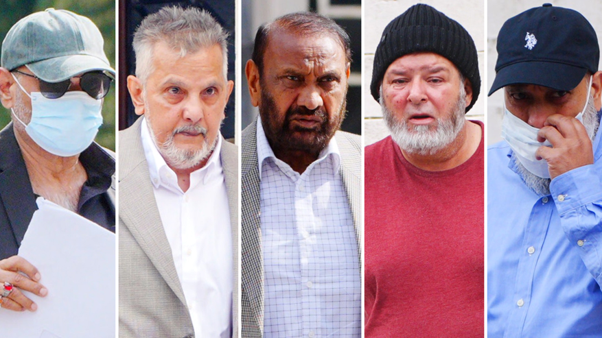 A composite image of five men outside court. They are all head and shoulder shots. The man on the far left has a mask on, cap and sunglasses and holds papers. The one next to him has greying hair and a beard with a white shirt and grey blazer, next to him the man has dark hair and facial hair and white striped shirt. Next to him the man has a black woolly hat and red t-shirt and far right the man has a dark blue cap, blue shirt and a mask over his face.

The man on the far left wears a blue three piece suit and has white hair, the one second left has dark black hair with glasses, he has a maroon blazer and pinstriped shirt, the man next to him has a three piece blue suit, he has a white goatee and shaved head, the man on the right has a blue suit on with a white shirt and red tie.
