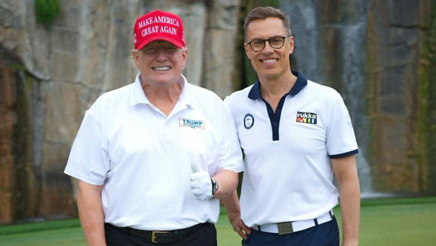 Donald Trump poses for a photo with Alexander Stubb