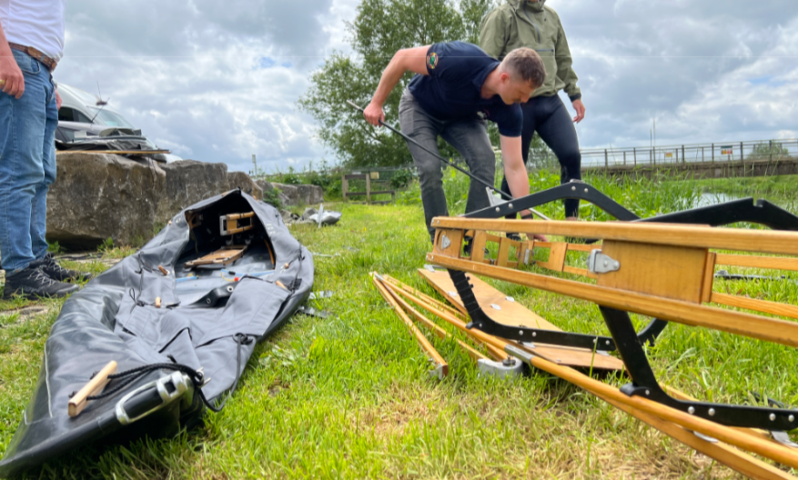 Royal marines building the kayak