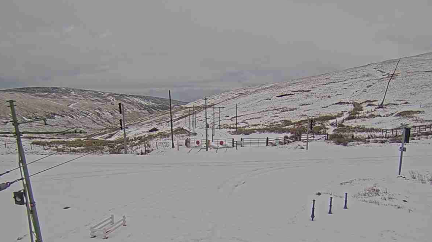A view from the mountain, you can see snow covering it.