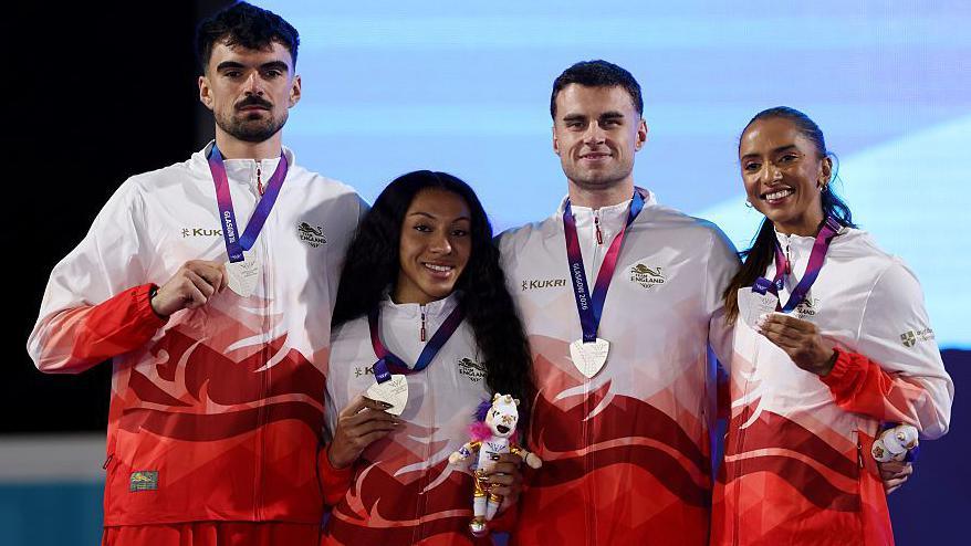 Silver medalists Ben Jefferies, Yemi Mary John, Toby Harries and Lina Nielsen of Team England pose for a photo with their medals