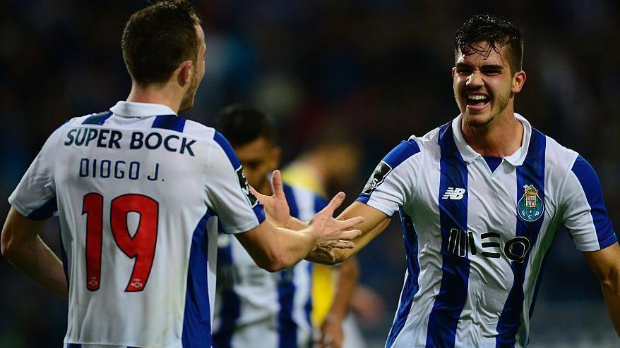 Porto's midfielder Andre Silva  celebrates with teammate forward Diogo Jota after scoring a goal 