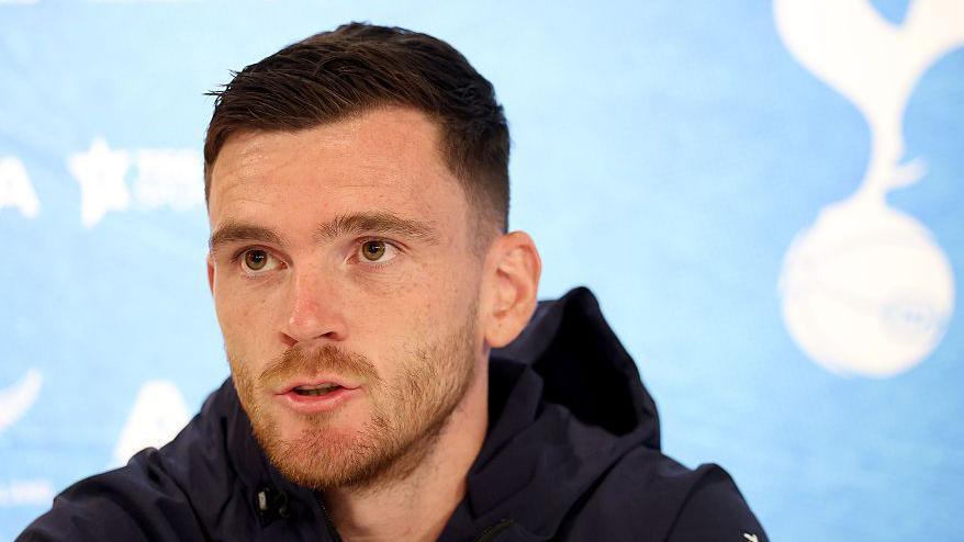 Andy Robertson speaking at a Tottenham news conference