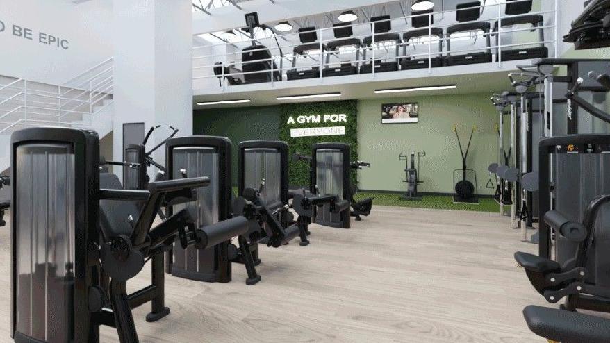 State of the art gym equipment on a plain wooden floor