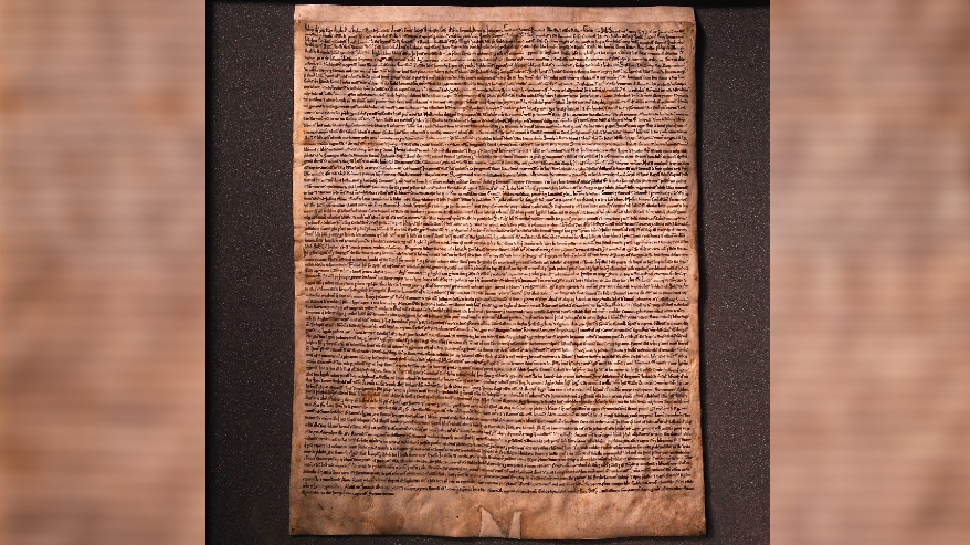 Salisbury Magna Carta - lots of rows of handwritten black ink on yellowed sheepskin vellum.