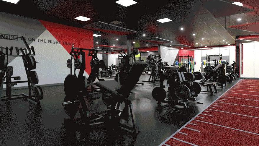 State of the art gym equipment on a black flooring