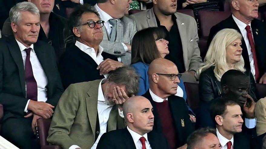 Manchester United co-chairman Sir Jim Ratcliffe covers his eyes during his side's 3-0 home defeat by arch rivals Liverpool