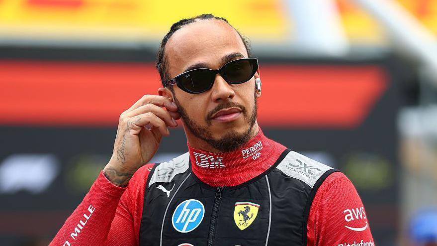 Lewis Hamilton looks on at the British Grand Prix