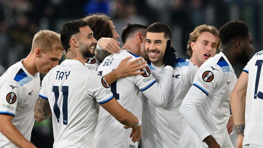 Lazio players celebrate scoring against Real Sociedad