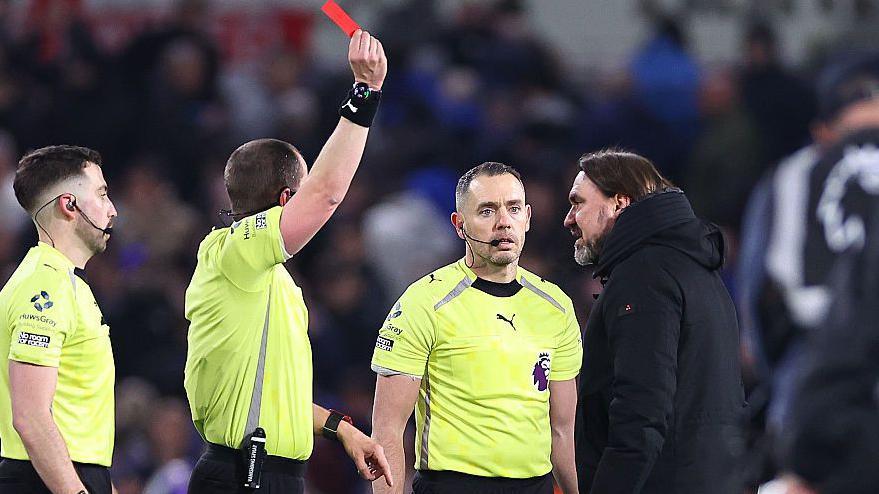 Daniel Farke is shown a red card by the referee