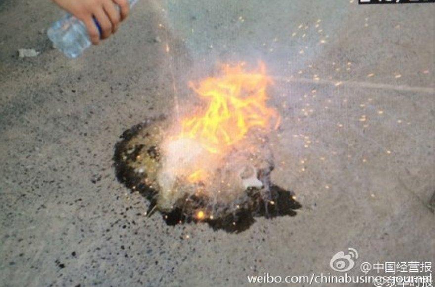 Image from Chinese site Weibo shows a chemical burning when water touched it - August 14 2015