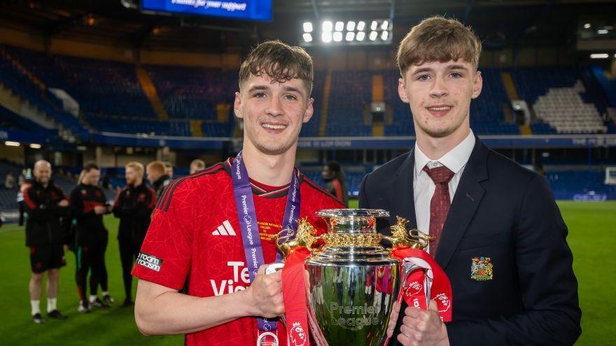 Jack Fletcher (left) and twin brother Tyler after Manchester United's Under-18 Premier League title play-off final victory over Chelsea