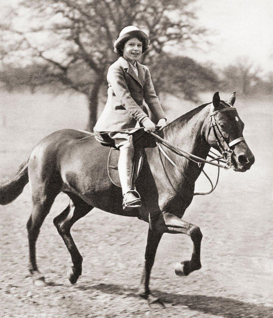 The Queen horse-riding as a child