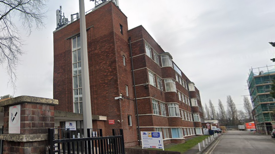 The exterior of the IMS building in Cheadle Heath, Stockport, where The Dragon Football Academy was based. The building is a 1930s, Art Deco-style four-storey office block.