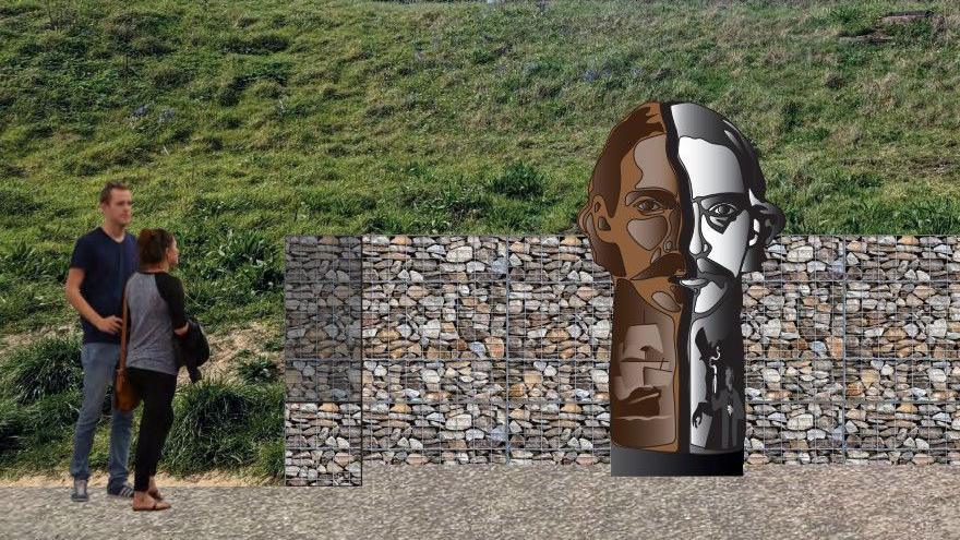 A computer generated image of how the sculpture will look at the location with two people standing nearby for scale. The sculpture is taller than the people and sits at the bottom of a grassy bank. Behind it is a retaining wall of stone-filled gabions.