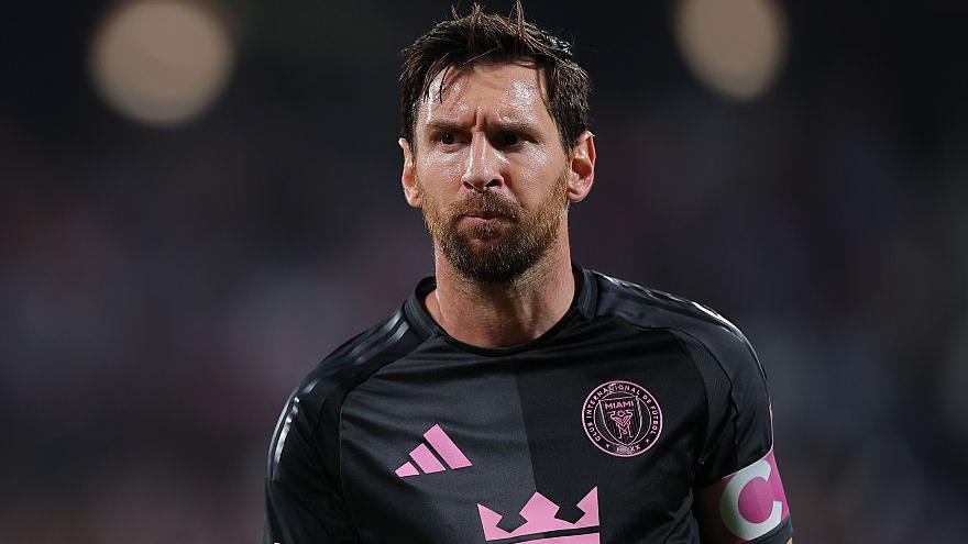 Lionel Messi in black and pink Inter Miami kit
