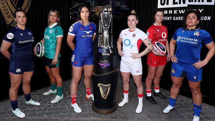 (L-R) Rachel Malcolm, captain of Scotland, Erin King, captain of Ireland, Manae Feleu, captain of France, Meg Jones, captain of England, Kate Williams, co-captain of Wales and Silvia Turani of Italy pose for a photo with the trophy during the Women's Six Nations launch at Guinness Open Gate Brewery in London