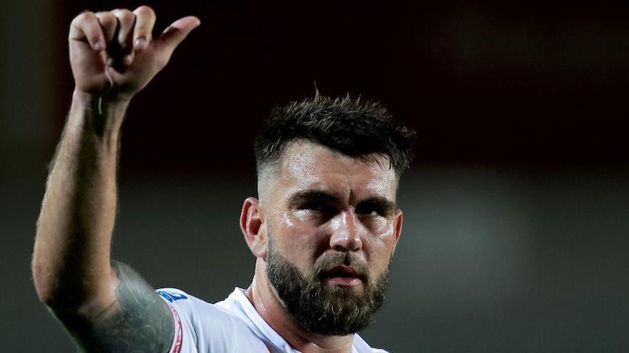 St Helens winger Kyle Feldt gives the thumbs-up to the crowd